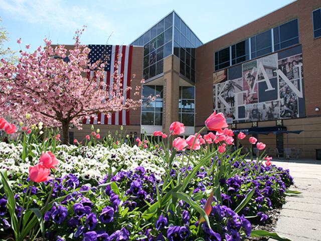 Miron Student Center surrounded by flowers in the spring time. 