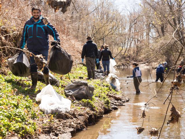 Science students clean up local river on Earth Day